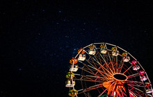 Ferris Wheel On A Background Of The Starry Night Sky