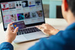 © Pixelated 275 - Using Laptop Online Shopping Payment Option Credit Card Successful and Continue Shopping