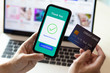 © Pixelated 275 - using smartphone and credit card online shopping