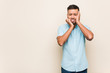 © Asier - Young south-asian man whining and crying disconsolately.