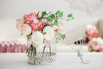 Wall Mural - Decoration for wedding party in romantic vintage style.  Decorative cell with gentle pink flowers on a white table