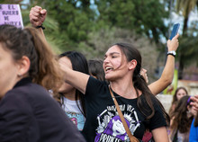 Woman Fighting In A Feminist Demonstration For Woman's Day In Valencia.