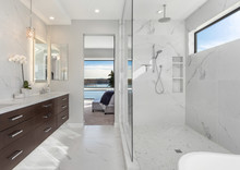 Beautiful Master Bathroom Interior In New Luxury Home With Walk-in Shower And Double Vanity