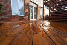 Backyard Wooden Deck Floor Boards With Fresh Brown Stain