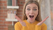 Surprised Young Woman Feeling Excited for Surprise