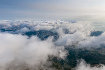 Sticker - Aerial view of city pass through cloud from Mt. Dai Mo Shan 