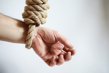 Wall Mural - Braided thick rope tied in a skein. Hemp rope for decoration and design. Background from a fishing rope.