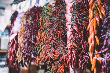 bunch of dried peppers in the market,  red spice healthy food in bazaar, traditional food in farmers marketplace; agriculture plant