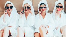 Hen Party. Spa Therapy Leisure. Happy Posh Women In Bathrobes Sunglasses Talking On Phones.