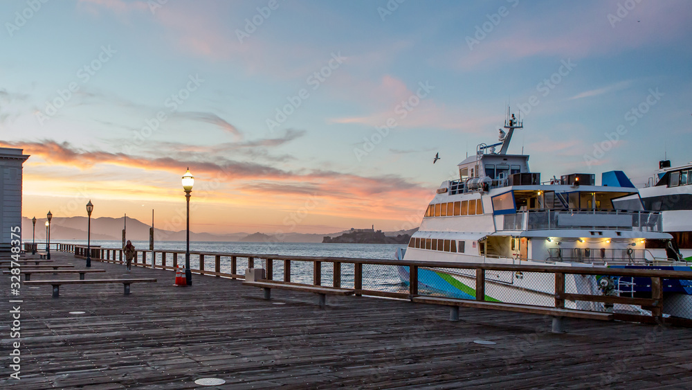 Docked Ferry Against Sunset At San Francisco Pier - obrazy, fototapety, plakaty 