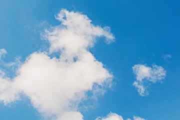 Wall Mural - White clouds in a blue sky