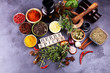 © beats_ - Spices and herbs on table. Food and cuisine ingredients with pepper and spices herbs sign with wooden cubes