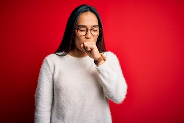 Sticker - Young beautiful asian woman wearing casual sweater and glasses over red background feeling unwell and coughing as symptom for cold or bronchitis. Health care concept.