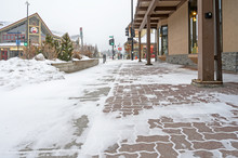 Snowy Winter Sidewalk In Downtown Canmore, Alberta, Canada