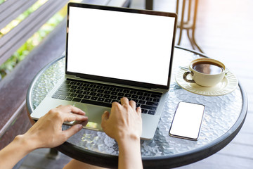 mockup image blank screen computer,cell phone with white background for advertising text,hand man using laptop texting mobile contact business search information on desk in office.marketing,design