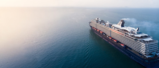Wall Mural - aerial view of beautiful white and black cruise ship above luxury cruise in the ocean sea concept to