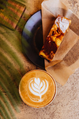 Wall Mural - Coffee, cappuccino and cake on light texture background