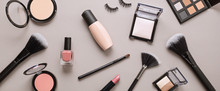 Flat Lay With Set Of Professional Decorative Cosmetics, Makeup Tools And Woman Accessories Over Gray Background With Copy Space. Beauty Blog, Fashion, Party And Shopping Concept