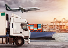 Truck, Aircraft And Cargo Ship In A Deposit With Packages Ready To Start To Deliver. Concept Of Transportation Industry