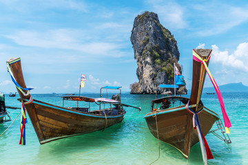 Thai traditional wooden longtail boat and beautiful sand beach at Koh Poda island in Krabi province.  Ao Nang, Thailand ,Krabi island is a most popular tourist destination in Thailand