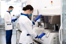 Female Researcher Doing Molecular Allergy Diagnostics In Laboratory