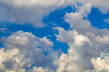 Poster - Clouds view from below. Sky is in the clouds. Background - cloudy sky. Nature. Sky on a sunny day. Skyline. Roof of the mouth. Panorama of heaven. Natural background