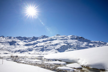 Wall Mural - Val Thorens, France - February 18, 2020: Landscape of Alps mountains in winter close to Lac du Lou, Val Thorens, France