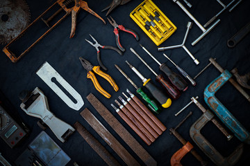 Photo top view a huge set collection of working hand and power tools many for the wooden on isolated black background