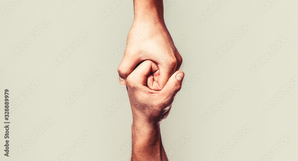 Helping hand outstretched, isolated arm, salvation. Close up help hand. Helping hand concept and international day of peace, support. Two hands, helping arm of a friend, teamwork - obrazy, fototapety, plakaty 
