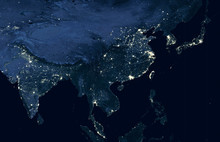 Earth At Night, World Map On Satellite Photo. City Lights Showing Human Activity In India, China, South Korea And Japan From Space. Elements Of This Image Furnished By NASA.