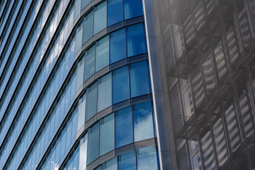 Exterior architectural detail of mixture facade elements and material of modern office buildings. Abstract Urban metropolis background.