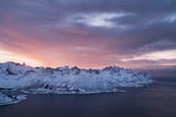 Fototapeta Łazienka - Panorama of snowy fjords and mountain range, Senja, Norway Amazing Norway nature seascape popular tourist attraction. Best famous travel locations. beautiful sunset within the amazing winter landscape