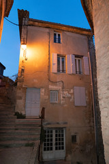 Sticker - Old house building door street village Gordes town at night in Provence France