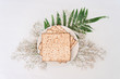 Passover background with matzoh and spring flower ranunculus. Top view with copy space. Happy Passover Spring Festive season greeting card. Jewish holidays arrangement