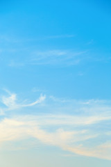 Vertical image pure white clouds like cotton wool in blue sky