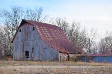 Poster - Old Barn With a Rusty Tin Roof