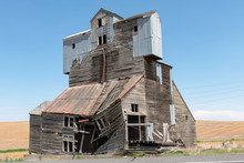 Abandoned Grain Elevator In A Field.  Image Taken In The Palouse, Washington.