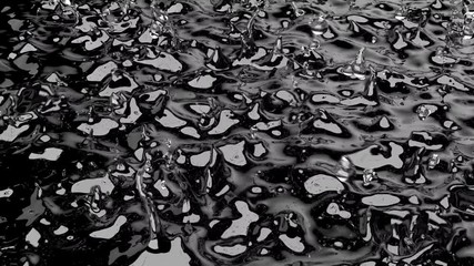 Wall Mural - close up slow motion rain water falling down on black floor. 3d animation 4k.