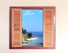 View Of Ocean Through Window With Wooden Shutters