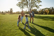 © Svitlana - Happy time. Excited family running outdoors on a sunny day
