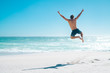Leinwandbild Motiv Jumping in joy for vacation