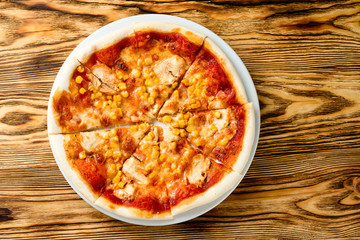 Canvas Print - Delicious pizza served on wooden table