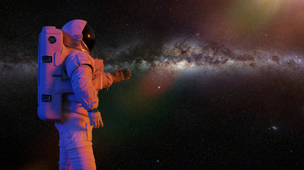 Poster - astronaut presenting an empty space in front of Milky Way galaxy