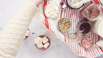 Sticker - Flat lay. Hot chocolate bar with variety of topping on the tray .