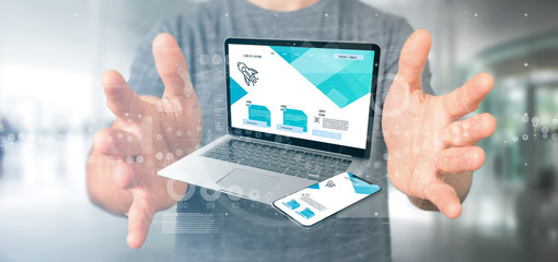 Poster - businessman holding a laptop and a smartphone - 3d rendering