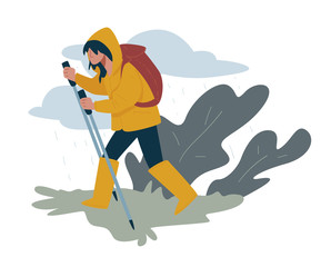 Wall Mural - hiking or trekking, walking tour with backpack, woman in raincoat and rubber boots