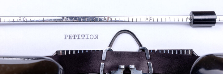 Fototapete - Petition - written on an old black typewriter