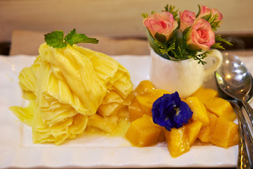 Wall Mural - Shaved frozen mango with mango fruit 