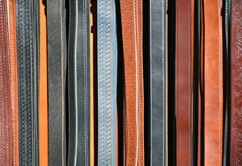 New leather fashion belt in a row