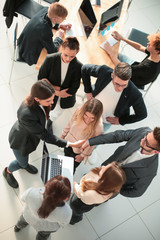 top view. a group of young business people in a modern office.